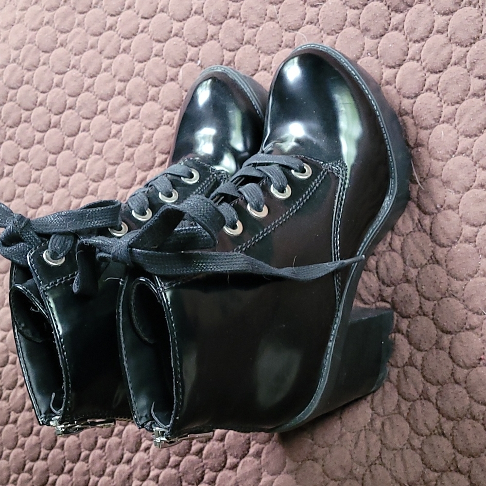 Womens black patent booties like new.